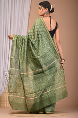 OLIVE GREEN CHANDERI SILK SAREE WITH DELICATE LEAF PRINT & ZARI BORDER