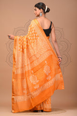 RADIANT ORANGE MAHESHWARI SILK COTTON SAREE WITH WHITE LEAF & FLORAL PRINTS