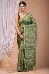OLIVE GREEN CHANDERI SILK SAREE WITH DELICATE LEAF PRINT & ZARI BORDER